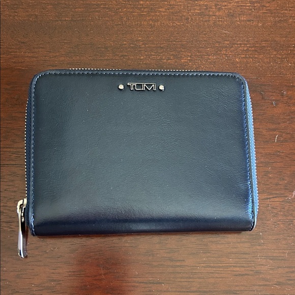 Tumi Handbags - NWT TUMI River Blue Metallic Leather Travel Wallet